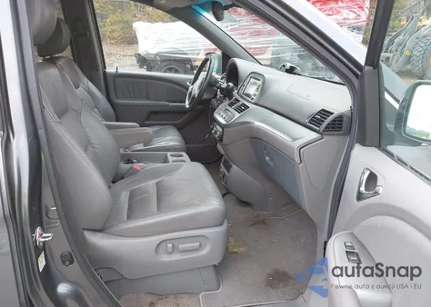 2010 Honda Odyssey Ex-L z USA, uszkodzony, nr VIN 5FNRL3H73AB021493